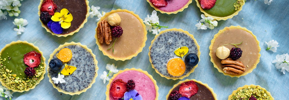 Table with variety of colorful pastries