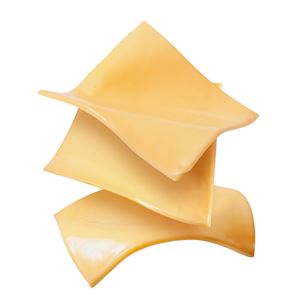 sliced cheese floating in the air