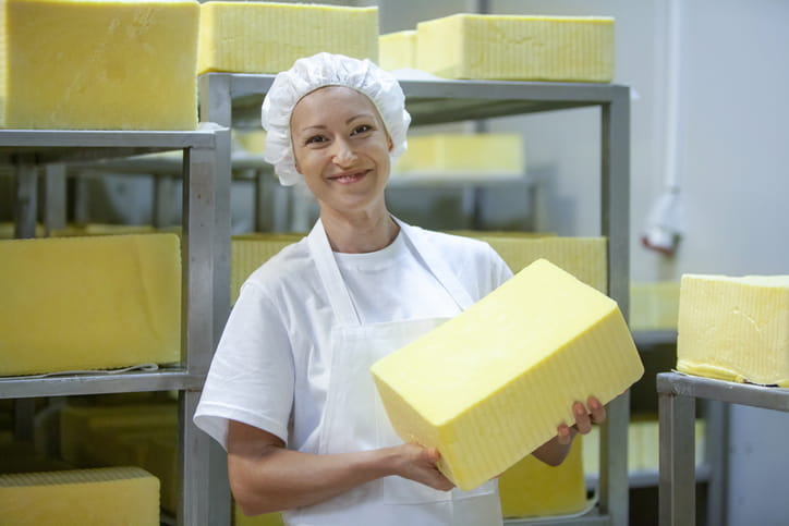 Lady holding cheese