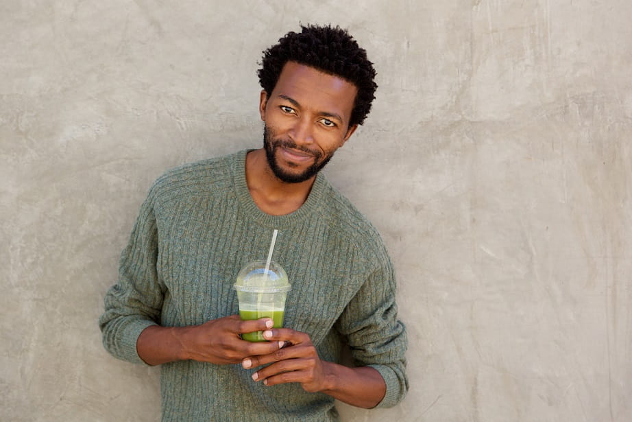 Man drinking smoothie